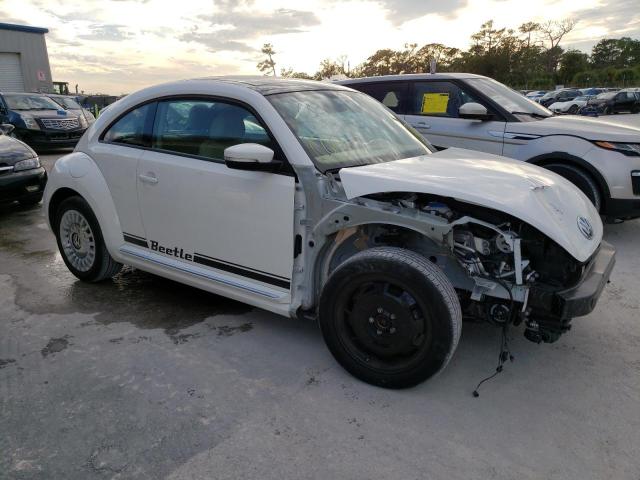 Photo 4 from auction – 2014 VOLKSWAGEN BEETLE with VIN 3VWJP7ATXEM620051