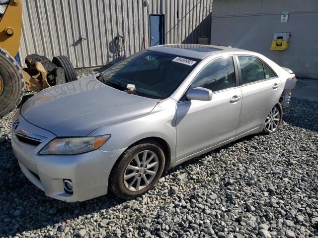 TOYOTA CAMRY HYBR 2011 with VIN 4T1BB3EKXBU139641 - Photo from auction