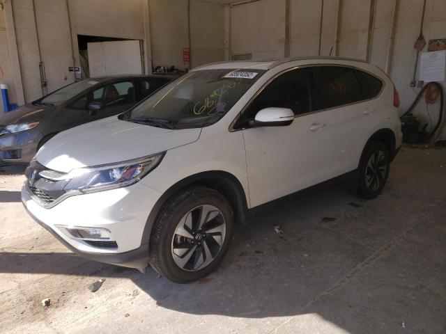 HONDA CR-V TOURI 2015 with VIN 5J6RM3H92FL020042 - Photo from auction