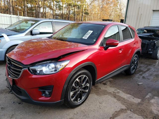 MAZDA CX-5 GT 2016 with VIN JM3KE4DY0G0747777 - Photo from auction