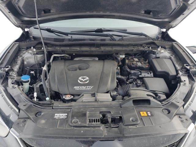 Photo 12 from auction – 2014 MAZDA CX-5 TOURI with VIN JM3KE2CY4E0369868
