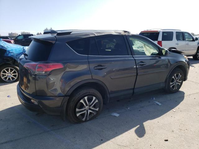Photo 3 from auction – 2018 TOYOTA RAV4 LE with VIN JTMZFREV2JJ184402