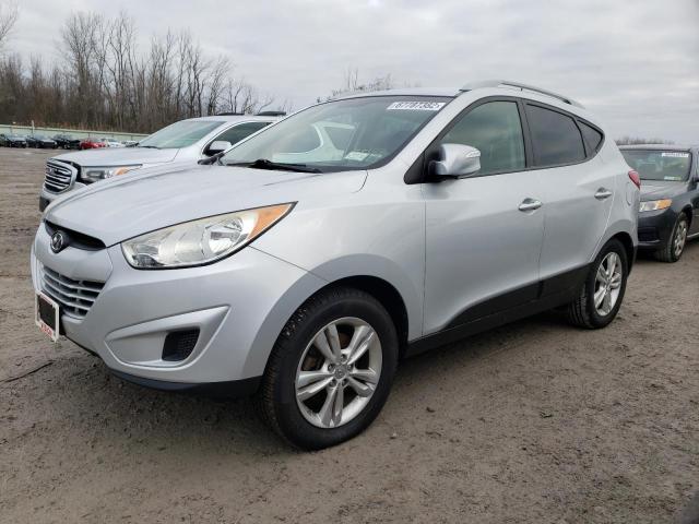 HYUNDAI TUCSON GLS 2012 with VIN KM8JUCAC3CU487139 - Photo from auction