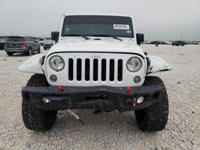 Photo 5 from auction – 2016 JEEP WRANGLER U with VIN 1C4BJWFG3GL336053