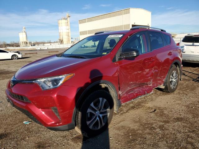 TOYOTA RAV4 LE 2018 with VIN 2T3BFREV4JW768870 - Photo from auction