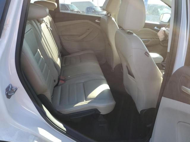 Photo 11 from auction – 2017 FORD ESCAPE TIT with VIN 1FMCU9J99HUA37938