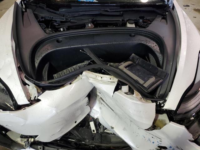 Photo 11 from auction – 2021 TESLA MODEL 3 with VIN 5YJ3E1EB9MF034847