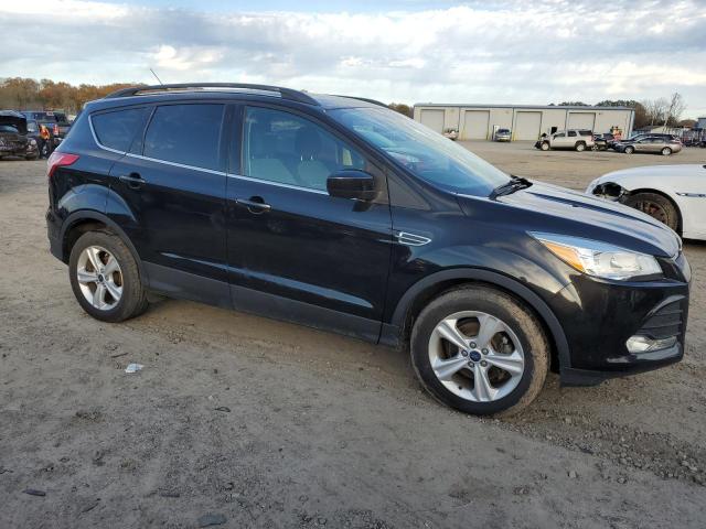 Photo 4 from auction – 2014 FORD ESCAPE SE with VIN 1FMCU0GXXEUE24494
