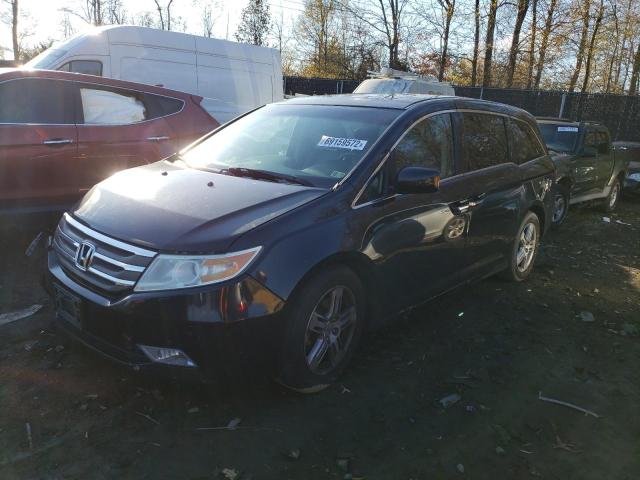 HONDA ODYSSEY TO 2011 with VIN 5FNRL5H90BB008974 - Photo from auction