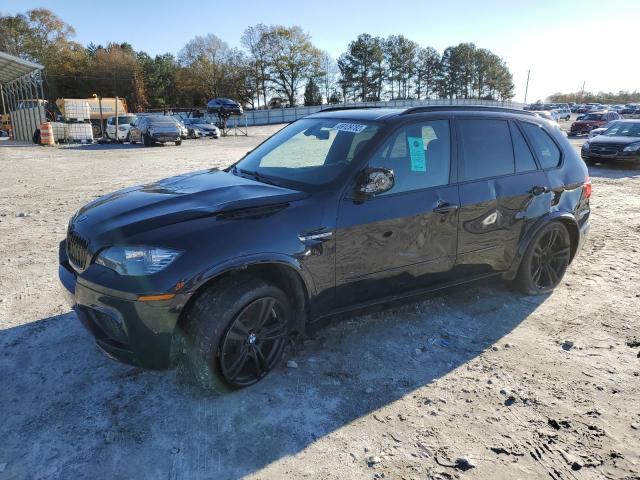 BMW X5 M 2011 with VIN 5YMGY0C54BLK26873 - Photo from auction