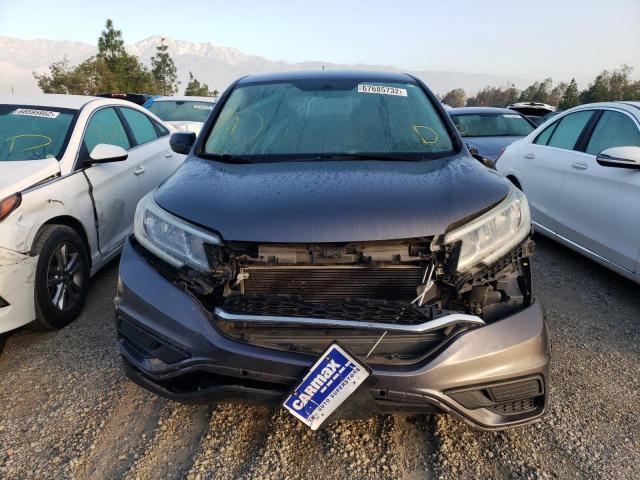 Photo 5 from auction – 2015 HONDA CR-V LX with VIN 3CZRM3H30FG714396