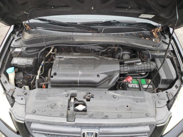 Photo 12 from auction – 2004 HONDA PILOT EXL with VIN 2HKYF18554H502602