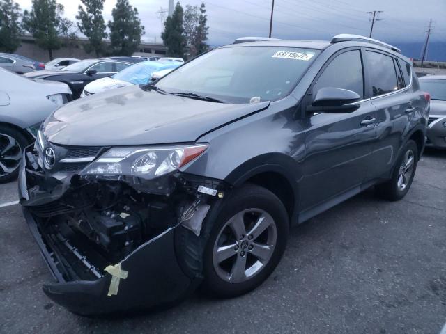TOYOTA RAV4 XLE 2015 with VIN 2T3RFREV1FW267408 - Photo from auction