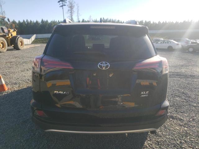 Photo 6 from auction – 2016 TOYOTA RAV4 XLE with VIN 2T3RFREV2GW409587