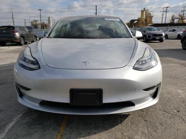 Photo 5 from auction – 2018 TESLA MODEL 3 with VIN 5YJ3E1EA7JF004071