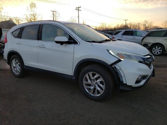 Photo 4 from auction – 2015 HONDA CR-V EXL with VIN 5J6RM4H79FL020110