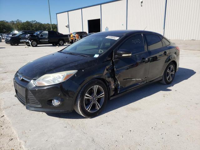 FORD FOCUS SE 2014 with VIN 1FADP3F21EL320155 - Photo from auction