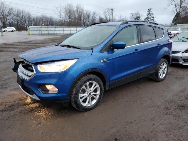FORD ESCAPE SE 2018 with VIN 1FMCU9GDXJUB46314 - Photo from auction