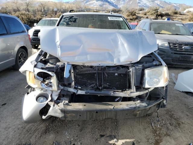 Photo 5 from auction – 2006 GMC ENVOY with VIN 1GKDT13S662348611