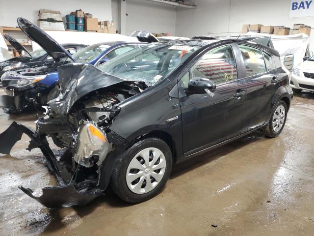 TOYOTA PRIUS C 2014 with VIN JTDKDTB35E1565285 - Photo from auction