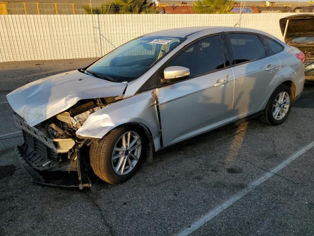 FORD FOCUS SE 2017 with VIN 1FADP3F2XHL286110 - Photo from auction
