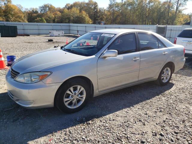 TOYOTA CAMRY LE 2004 with VIN 4T1BF32K64U569386 - Photo from auction