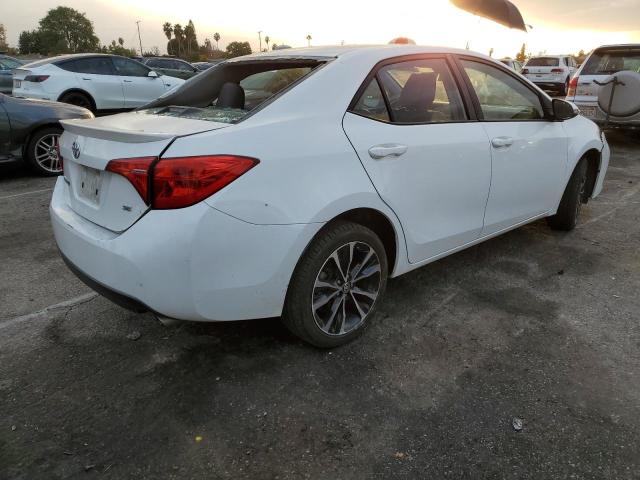 Photo 3 from auction – 2017 TOYOTA COROLLA L with VIN 5YFBURHE9HP606223