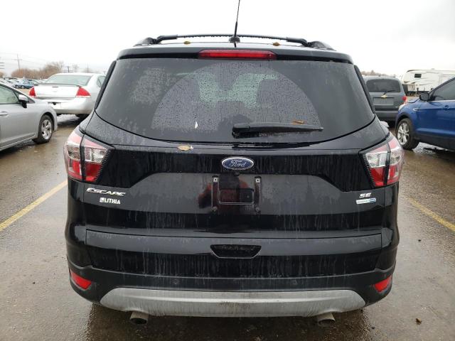 Photo 6 from auction – 2017 FORD ESCAPE SE with VIN 1FMCU9GD8HUC27693