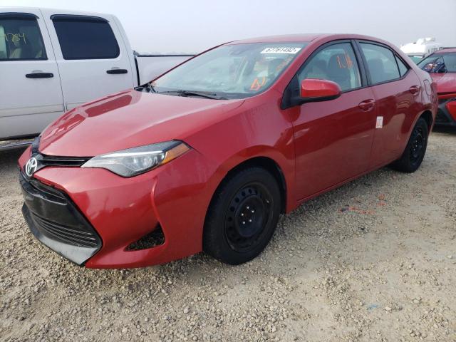 TOYOTA COROLLA L 2018 with VIN 5YFBURHE5JP821989 - Photo from auction