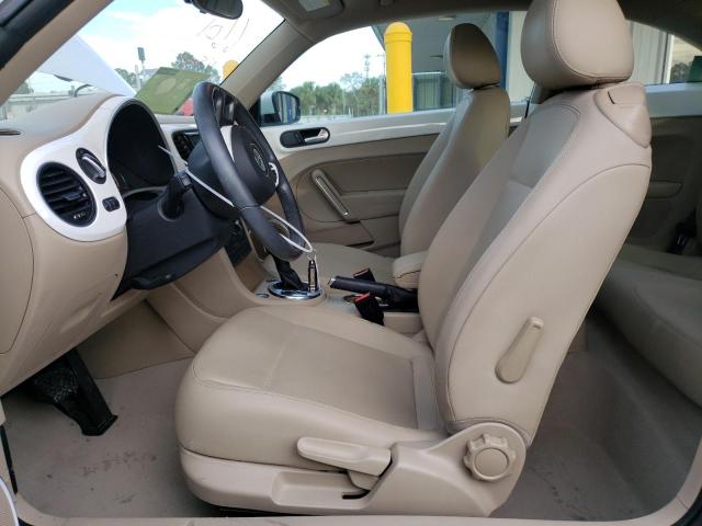 Photo 7 from auction – 2014 VOLKSWAGEN BEETLE with VIN 3VWJP7ATXEM620051