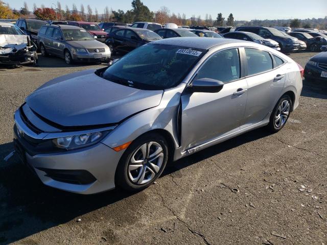 HONDA CIVIC LX 2018 with VIN 19XFC2E53JE001377 - Photo from auction