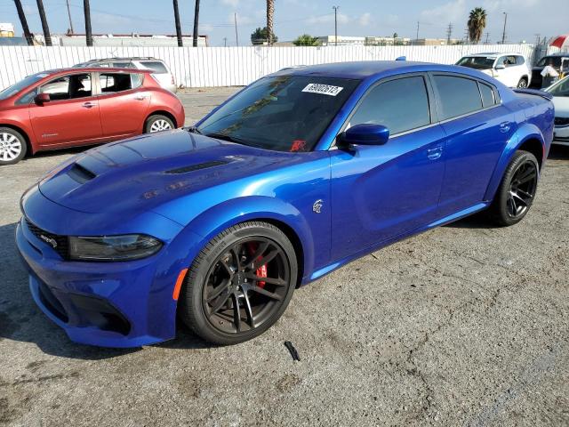 DODGE CHARGER SR 2022 with VIN 2C3CDXL92NH148128 - Photo from auction