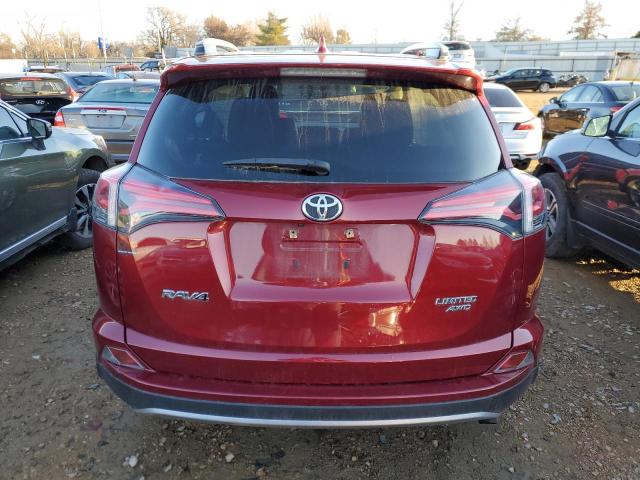 Photo 6 from auction – 2018 TOYOTA RAV4 LIMIT with VIN JTMDFREVXJD232611