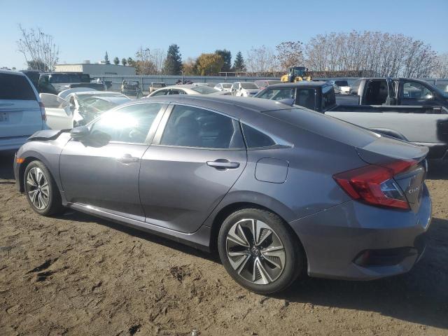 Photo 2 from auction – 2017 HONDA CIVIC EXL with VIN 2HGFC1F74HH657033