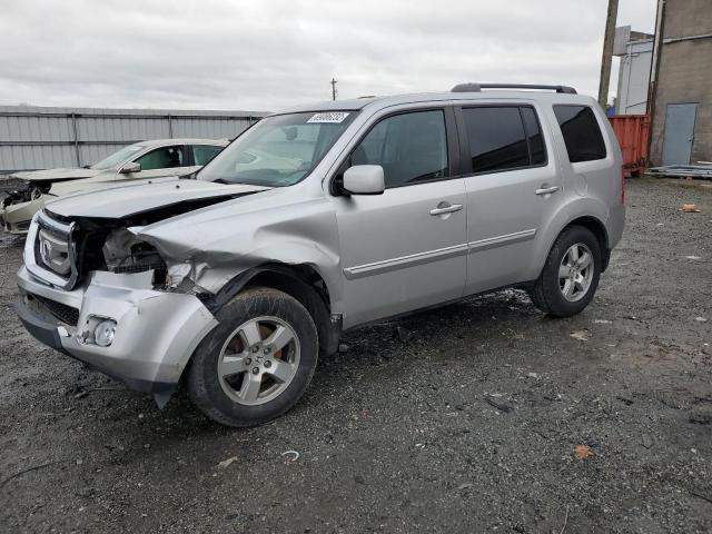 HONDA PILOT EXL 2011 with VIN 5FNYF4H50BB062950 - Photo from auction