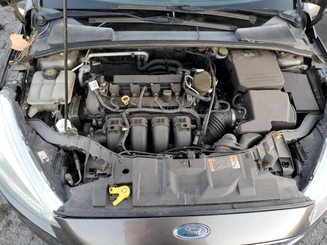 Foto 11 de la subasta – 2015 FORD FOCUS SE con VIN 1FADP3F21FL231977