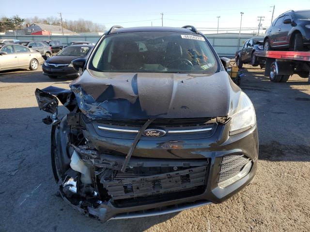 Photo 5 from auction – 2015 FORD ESCAPE SE with VIN 1FMCU9G99FUB44640