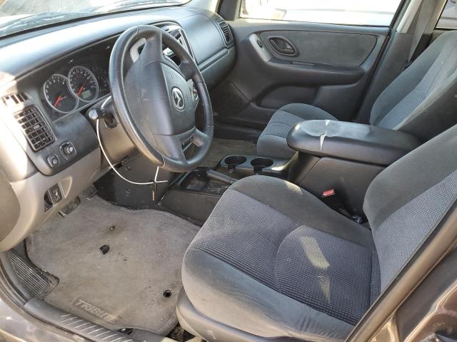 Photo 7 from auction – 2004 MAZDA TRIBUTE LX with VIN 4F2YZ04104KM11615