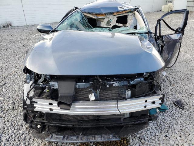 Photo 5 from auction – 2022 TOYOTA COROLLA LE with VIN JTDVPMAE2NJ219451