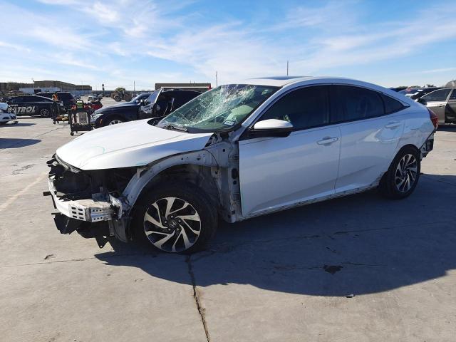 HONDA CIVIC EX 2018 with VIN 19XFC2F79JE012562 - Photo from auction