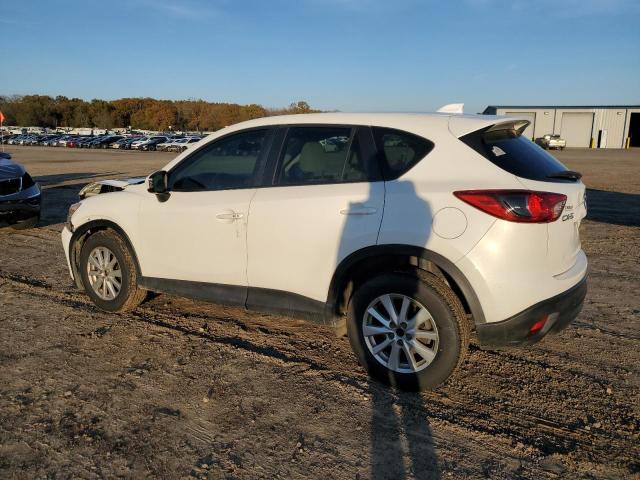 Photo 2 from auction – 2014 MAZDA CX-5 SPORT with VIN JM3KE2BE4E0377041