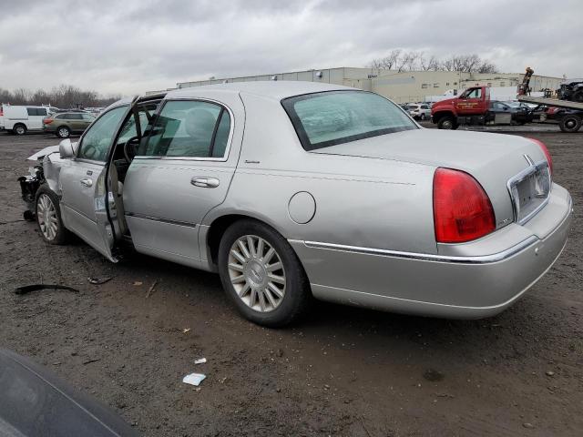 Photo 2 from auction – 2004 LINCOLN TOWN CAR E with VIN 1LNHM81W44Y619597