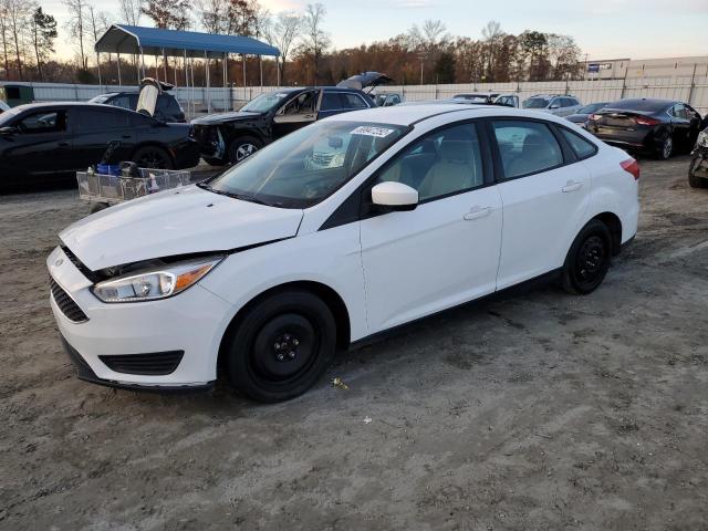 FORD FOCUS SE 2018 with VIN 1FADP3F28JL231290 - Photo from auction