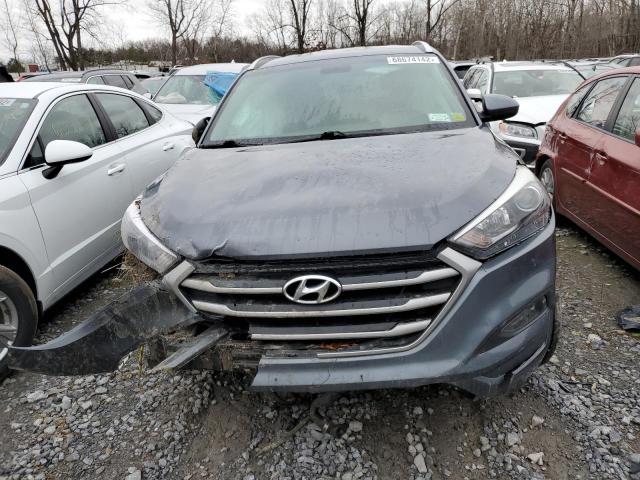 Photo 5 from auction – 2017 HYUNDAI TUCSON LIM with VIN KM8J3CA48HU437615