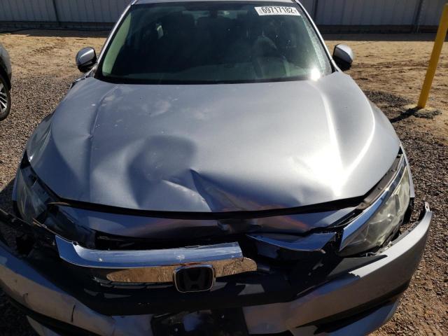 Photo 11 from auction – 2018 HONDA CIVIC LX with VIN 2HGFC2F5XJH558422