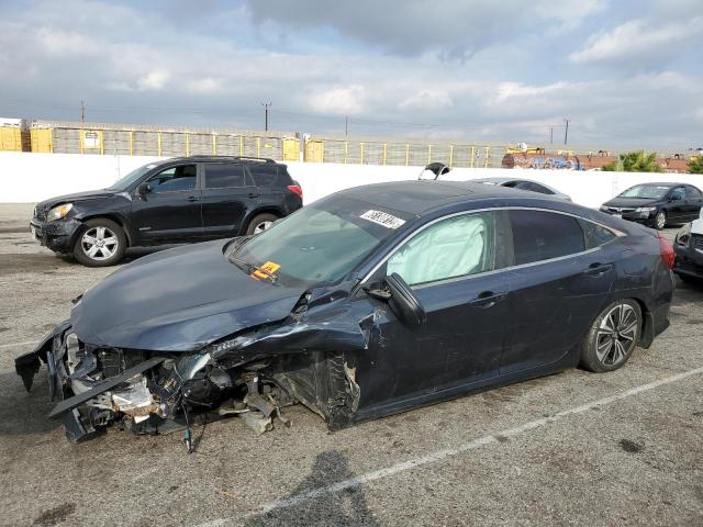 HONDA CIVIC EX 2017 with VIN 2HGFC1F30HH642820 - Photo from auction