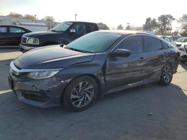 HONDA CIVIC EX 2018 with VIN 2HGFC2F76JH514645 - Photo from auction