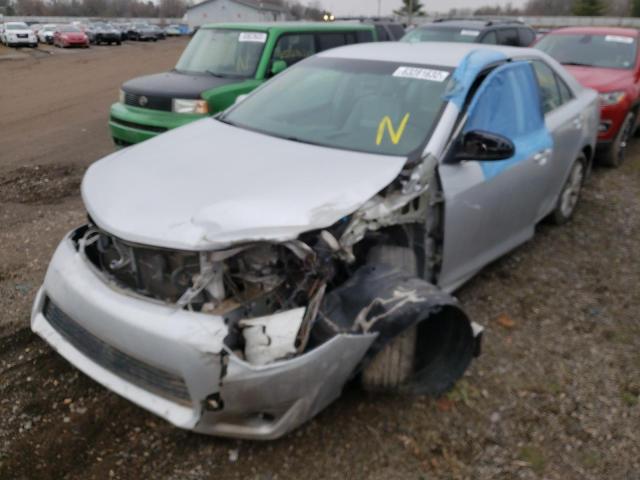 Photo 2 from auction – 2012 TOYOTA CAMRY HYBR with VIN 4T1BD1FK0CU030863