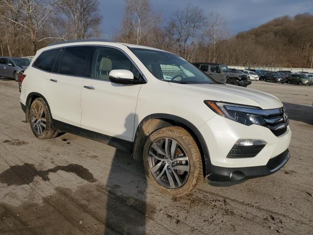 Photo 4 from auction – 2017 HONDA PILOT ELIT with VIN 5FNYF6H02HB102809