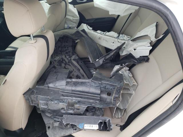Photo 12 from auction – 2019 HONDA CIVIC LX with VIN 19XFC2F65KE005164